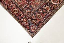 Backside of handmade 1940s Heriz rug showing knot structure and weave density