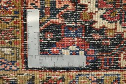 Corner detail of 1940s Heriz rug showing border pattern and Wool pile