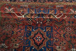 Corner detail of 1930s Heriz rug showing border pattern and Wool pile