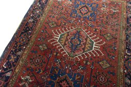 Backside of handmade 1930s Heriz rug showing knot structure and weave density