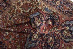 Surface texture of 1930s Heriz rug with natural Wool and intricate pattern