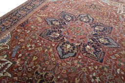 Backside of handmade 1930s Heriz rug showing knot structure and weave density