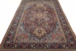 Surface texture of 1930s Heriz rug with natural Wool and intricate pattern
