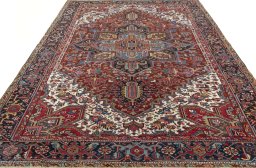 Surface texture of 1930s Heriz rug with natural Wool and intricate pattern