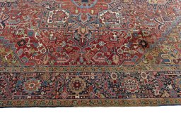Corner detail of 1930s Heriz rug showing border pattern and Wool pile