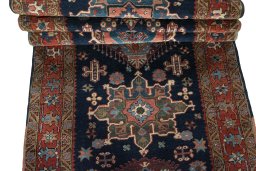 Full view of 1930s Heriz rug from Iran / Persia, 422 × 102 cm in Blue tones