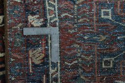 Close-up detail of 1930s Heriz rug from Iran / Persia showing Wool weave