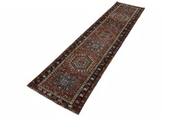 Corner detail of 1930s Heriz rug showing border pattern and Wool pile