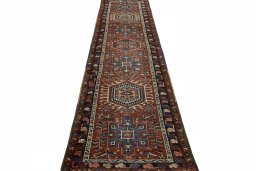 Surface texture of 1930s Heriz rug with natural Wool and intricate pattern