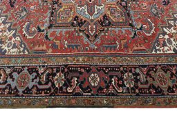 Corner detail of 1930s Heriz rug showing border pattern and Wool pile