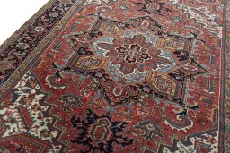 Backside of handmade 1930s Heriz rug showing knot structure and weave density