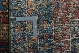 Close-up detail of 1930s Heriz rug from Iran / Persia showing Wool weave