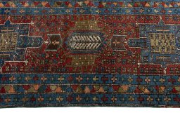 Close-up detail of 1930s Heriz rug from Iran / Persia showing Wool weave