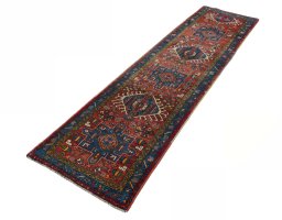 Corner detail of 1930s Heriz rug showing border pattern and Wool pile