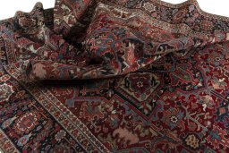 Surface texture of 1930s Heriz rug with natural Wool and intricate pattern