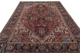 Surface texture of 1930s Heriz rug with natural Wool and intricate pattern