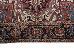 Full view of 1930s Heriz rug from Iran / Persia, 360 × 250 cm in Red tones