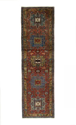 Full view of 1930s Heriz rug from Iran / Persia, 328 × 97 cm in Red tones