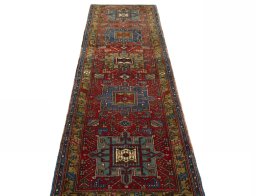 Surface texture of 1930s Heriz rug with natural Wool and intricate pattern