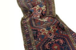 Corner detail of 1930s Heriz rug showing border pattern and Wool pile