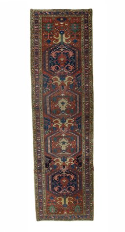 Full view of 1930s Heriz rug from Iran / Persia, 326 × 96 cm in Red tones