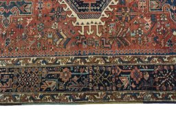 Corner detail of 1930s Heriz rug showing border pattern and Wool pile