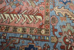 Corner detail of 1930s Heriz rug showing border pattern and Wool pile