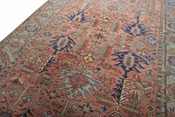 Backside of handmade 1930s Heriz rug showing knot structure and weave density