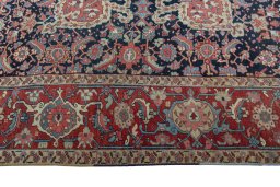 Corner detail of 1930s Heriz rug showing border pattern and Wool pile