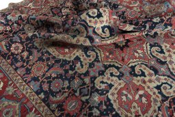 Surface texture of 1930s Heriz rug with natural Wool and intricate pattern
