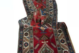 Corner detail of 1950s Heriz rug showing border pattern and Wool pile