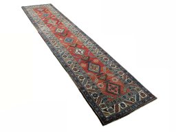 Close-up detail of 1950s Heriz rug from Iran / Persia showing Wool weave