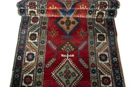 Full view of 1950s Heriz rug from Iran / Persia, 432 × 96 cm in Red tones