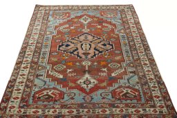 Surface texture of 1930s Heriz rug with natural Wool and intricate pattern