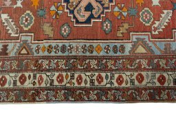 Full view of 1930s Heriz rug from Iran / Persia, 186 × 144 cm in Red tones