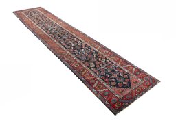 Close-up detail of 1930s Heriz rug from Iran / Persia showing Wool weave
