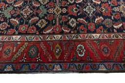 Close-up detail of 1930s Heriz rug from Iran / Persia showing Wool weave