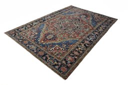 Corner detail of 1930s Heriz rug showing border pattern and Wool pile