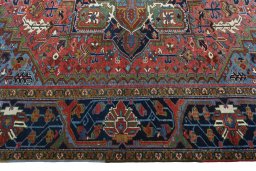 Corner detail of 1930s Heriz rug showing border pattern and Wool pile