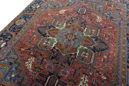 Backside of handmade 1930s Heriz rug showing knot structure and weave density