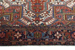 Full view of 1930s Heriz rug from Iran / Persia, 325 × 220 cm in Red tones