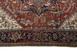 Corner detail of 1930s Heriz rug showing border pattern and Wool pile