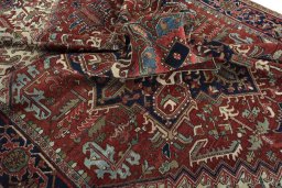 Surface texture of 1930s Heriz rug with natural Wool and intricate pattern