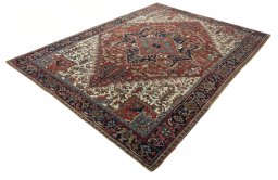 Corner detail of 1930s Heriz rug showing border pattern and Wool pile