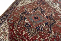 Backside of handmade 1930s Heriz rug showing knot structure and weave density