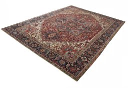 Corner detail of 1930s Heriz rug showing border pattern and Wool pile