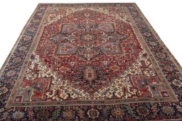 Surface texture of 1930s Heriz rug with natural Wool and intricate pattern