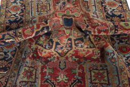 Surface texture of 1930s Heriz rug with natural Wool and intricate pattern