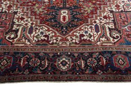 Full view of 1930s Heriz rug from Iran / Persia, 387 × 295 cm in Red tones