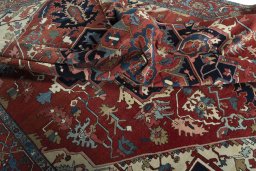 Surface texture of 1930s Heriz rug with natural Wool and intricate pattern